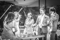 Guests laughing during a country wedding in France