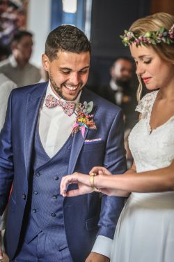 Bride and groom exchanging vows at a French wedding