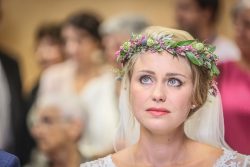 Emotional bride during a French countryside wedding
